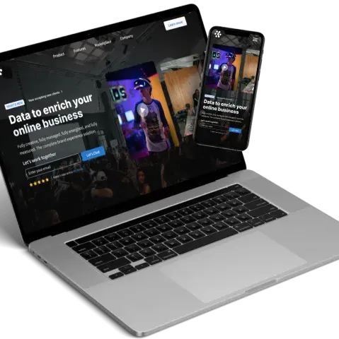 Laptop and mobile phone showing a design for a VR based company