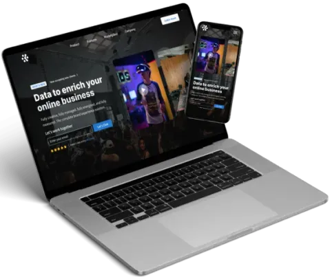 Laptop and mobile phone showing a design for a VR based company